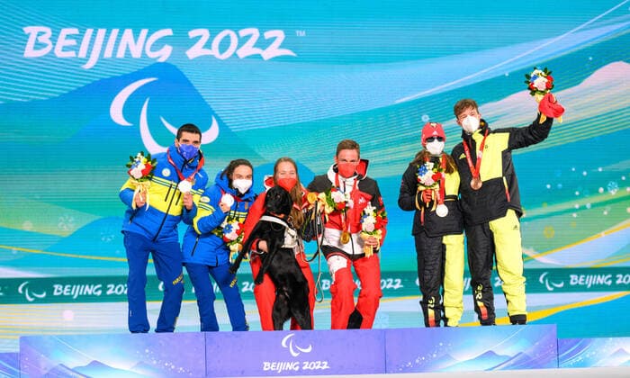Paralympic Games Beijing 2022 09 3 2022 Day 5 ZHANGIJAKOU, PEOPLES REPUBLIC OF CHINA MARCH 09 Image of the Paralympic Games Beijing 2022 during the medal ceremonies at Zhangijakou Medals Plaza of Zhangijakou on 20 8 2021 in Hebei Peoples Republic of China KAZMAIER, Linn GER , local club SZ Roemerstein WUER , date of birth 05 11 2006 place of birth Nuertingen, paralympic classification B3 and her guide BAUMANN, Florian GER on the podest for their bronce medal Silver goes to Ukraine SHYSHKOVA Oksana and her guide MARCHENKO Andriy Gold goes to Austria EDLINGER Carina and her guide LAMPL Lorenz Josef Oliver Kremer DBS Copyright: xBEAUTIFULxSPORTS OliverxKremerx