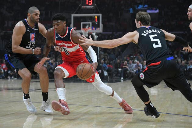 LOS ANGELES, CA - MARCH 09: LA Clippers forward Nicolas Batum (33) and Luke Kennard (5) guard Washington Wizards forward Rui Hachimura (8) in a NBA, Basketball Herren, USA basketball game played on March 9, 2022 at Crypto.com Arena in Los Angeles, CA. (Photo by John McCoy Icon Sportswire) NBA: MAR 09 Wizards at Clippers Icon2203060696