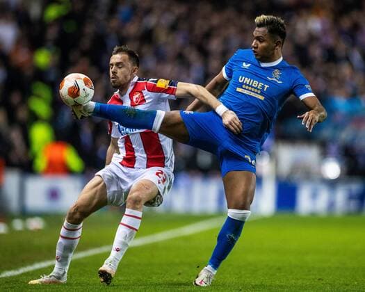 Mandatory Credit: Photo by Kirk O Rourke Rangers FC Shutterstock (12843268cg) Milan Rodic of Red Star Belgrade battles with Alfredo Morelos of Rangers during the Europa League match at Ibrox Stadium, Glasgow. Rangers v Red Star Belgrade, Europa League, Round of 16, First Leg, Football, Ibrox Stadium, Glasgow, UK - 10 Mar 2022 EDITORIAL USE ONLY No use with unauthorised audio, video, data, fixture lists, club league logos or live services. Online in-match use limited to 120 images, no video emulation. No use in betting, games or single club league player publications. Rangers v Red Star Belgrade, Europa League, Round of 16, First Leg, Football, Ibrox Stadium, Glasgow, UK - 10 Mar 2022 EDITORIAL USE ONLY No use with unauthorised audio, video, data, fixture lists, club league logos or live services. Online in-match use limited to 120 images, no video emulation. No use in betting, games or single club league player publications. Copyright: xKirkxO Rourke RangersxFC Shutterstockx 12843268cg