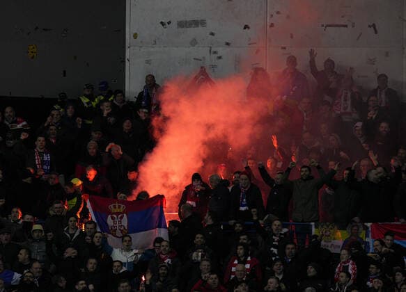Mandatory Credit: Photo by Stuart Wallace Shutterstock (12843073bb) Crvena Zvezda fans light a red pyrotechnic Rangers v Red Star Belgrade, Europa League, Round of 16, First Leg, Football, Ibrox Stadium, Glasgow, UK - 10 Mar 2022 EDITORIAL USE ONLY No use with unauthorised audio, video, data, fixture lists, club league logos or live services. Online in-match use limited to 120 images, no video emulation. No use in betting, games or single club league player publications. Rangers v Red Star Belgrade, Europa League, Round of 16, First Leg, Football, Ibrox Stadium, Glasgow, UK - 10 Mar 2022 EDITORIAL USE ONLY No use with unauthorised audio, video, data, fixture lists, club league logos or live services. Online in-match use limited to 120 images, no video emulation. No use in betting, games or single club league player publications. Copyright: xStuartxWallace Shutterstockx 12843073bb