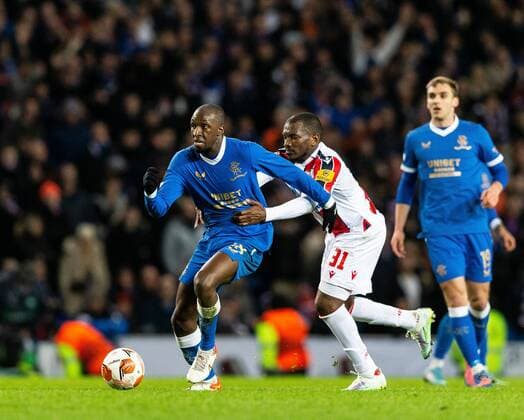 Mandatory Credit: Photo by Luke Nickerson Rangers FC Shutterstock (12843267co) Rangers Midfielder Glen Kamara is held back by Red Star Belgrade Midfielder El Fardou Ben Nabouhane Rangers v Red Star Belgrade, Europa League, Round of 16, First Leg, Football, Ibrox Stadium, Glasgow, UK - 10 Mar 2022 EDITORIAL USE ONLY No use with unauthorised audio, video, data, fixture lists, club league logos or live services. Online in-match use limited to 120 images, no video emulation. No use in betting, games or single club league player publications. Rangers v Red Star Belgrade, Europa League, Round of 16, First Leg, Football, Ibrox Stadium, Glasgow, UK - 10 Mar 2022 EDITORIAL USE ONLY No use with unauthorised audio, video, data, fixture lists, club league logos or live services. Online in-match use limited to 120 images, no video emulation. No use in betting, games or single club league player publications. Copyright: xLukexNickerson RangersxFC Shutterstockx 12843267co