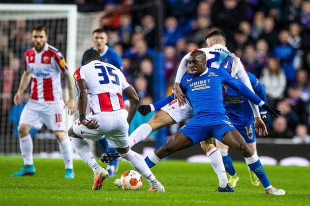 Mandatory Credit: Photo by Kirk O Rourke Rangers FC Shutterstock (12843268ed) Glen Kamara of Rangers battles with Cristiano Piccini of Red Star Belgrade during the Europa League match at Ibrox Stadium, Glasgow. Rangers v Red Star Belgrade, Europa League, Round of 16, First Leg, Football, Ibrox Stadium, Glasgow, UK - 10 Mar 2022 EDITORIAL USE ONLY No use with unauthorised audio, video, data, fixture lists, club league logos or live services. Online in-match use limited to 120 images, no video emulation. No use in betting, games or single club league player publications. Rangers v Red Star Belgrade, Europa League, Round of 16, First Leg, Football, Ibrox Stadium, Glasgow, UK - 10 Mar 2022 EDITORIAL USE ONLY No use with unauthorised audio, video, data, fixture lists, club league logos or live services. Online in-match use limited to 120 images, no video emulation. No use in betting, games or single club league player publications. Copyright: xKirkxO Rourke RangersxFC Shutterstockx 12843268ed