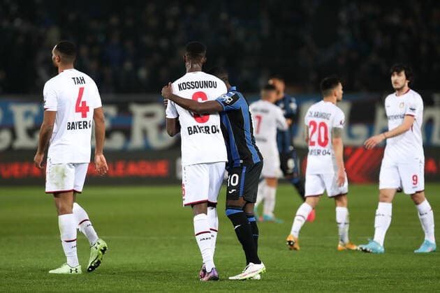 BERGAMO, ITALY - MARCH 10: Jeremie Boga striker for Atalanta B.C. and Odilon Kossounou defender Bayer 04 Leverkusen during the Europa League football match between Atalanta and Leverkusen at Gewiss Stadium on March 10, 2022 in Bergamo, Italy. (Photo by Stefano Nicoli Speed Media Icon Sportswire) SOCCER: MAR 10 Europa League - Leverkusen at Atalanta Icon220310080