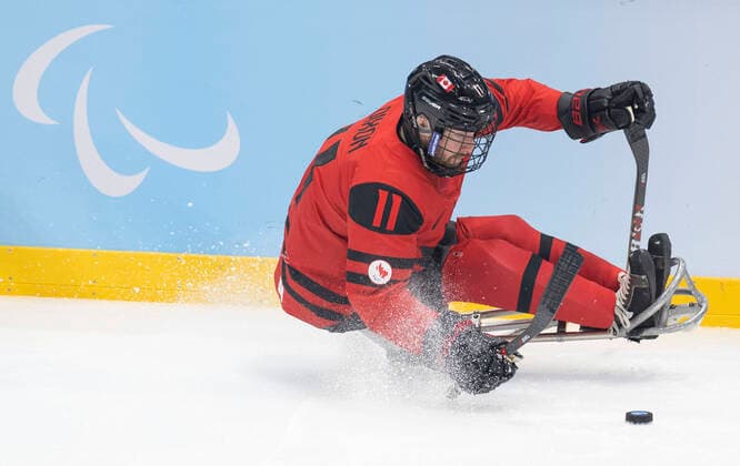 (220311) -- BEIJING, March 11, 2022 -- Adam Dixon of Canada competes during the para Ice hockey, Eishockey semifinal match between Canada and South Korea of Beijing 2022 Winter Paralympics at National Indoor Stadium in Beijing, March 11, 2022. ) (SP)CHINA-BEIJING-WINTER PARALYMPICS-PARA ICE HOCKEY-SEMIFINAL-CAN VS KOR CaixYang 