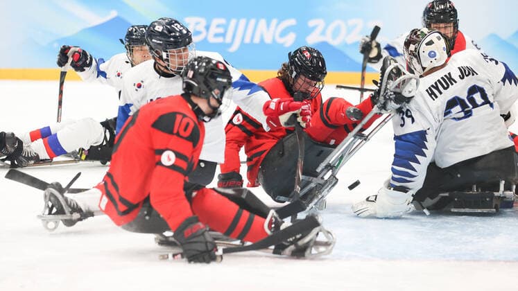 (220311) -- BEIJING, March 11, 2022 -- James Dunn (3rd R) of Canada competes during the para Ice hockey, Eishockey semifinal match between Canada and South Korea of Beijing 2022 Winter Paralympics at National Indoor Stadium in Beijing, March 11, 2022. ) (SP)CHINA-BEIJING-WINTER PARALYMPICS-PARA ICE HOCKEY-SEMIFINAL-CAN VS KOR MaxXiping 