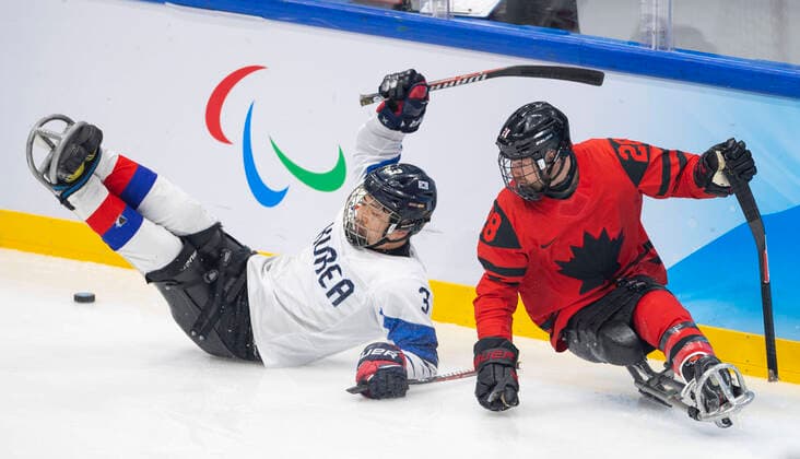 (220311) -- BEIJING, March 11, 2022 -- Ryu Jee Hyun (L) of South Korea competes during the para Ice hockey, Eishockey semifinal match between Canada and South Korea of Beijing 2022 Winter Paralympics at National Indoor Stadium in Beijing, March 11, 2022. ) (SP)CHINA-BEIJING-WINTER PARALYMPICS-PARA ICE HOCKEY-SEMIFINAL-CAN VS KOR CaixYang 