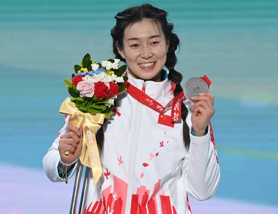 (220311) -- BEIJING, March 11, 2022 -- Silver medalist Liu Sitong of China reacts during the awarding ceremony for the Para Alpine Skiing Women s Giant Slalom Sitting event of Beijing 2022 Paralympic Winter games, Winterspiele,Spiele, Summer games at Yanqing Medals Plaza in Yanqing District, Beijing, capital of China, March 11, 2022. ) (SP)CHINA-BEIJING-WINTER PARALYMPICS-PARA ALPINE SKIING-WOMEN S GIANT SLALOM-AWARDING CEREMONY(CN) LixJianan 