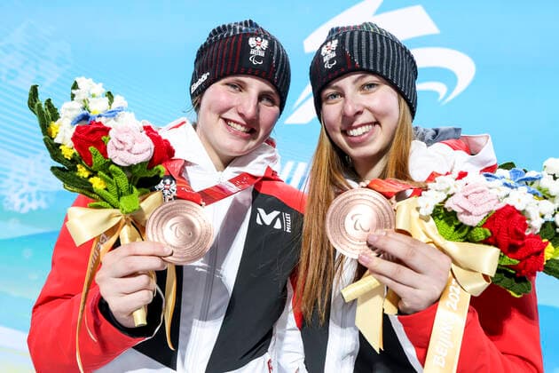 PARALYMPICS - Winter Paralympics Beijing 2022 YANQING,CHINA,11.MAR.22 - PARALYMPICS, ALPINE SKIING - Paralympic Winter games, Winterspiele,Spiele, Summer games Beijing 2022, giant slalom, ladies. Image shows Barbara Aigner and Klara Sykora (AUT). Keywords: medal.  GEPAxpictures xPatrickxSteiner