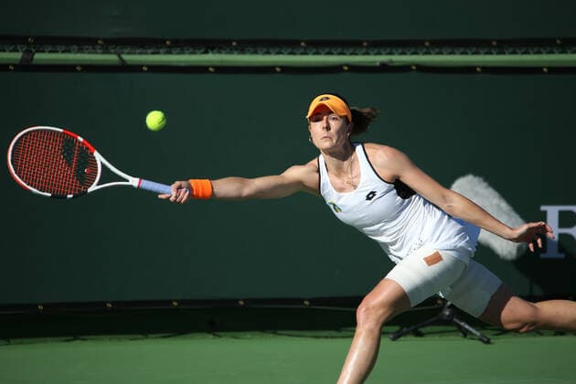 INDIAN WELLS, CA - MARCH 11: Alize Cornet (FRA) hits a forehand during the BNP Paribas Open on March 11, 2022 at Indian Wells Tennis Garden in Indian Wells, CA. (Photo by George Walker Icon Sportswire) TENNIS: MAR 11 BNP Paribas Open Icon220311057