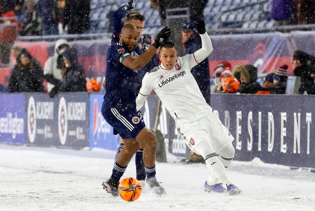 FOXBOROUGH, MA - MARCH 12: New England Revolution defender Andrew Farrell (2) keeps the ball from Real Salt Lake forward Bobby Wood (7) during a match between the New England Revolution and Real Salt Lake on March 12, 2022, at Gillette Stadium in Foxborough, Massachusetts. (Photo by Fred Kfoury III Icon Sportswire) SOCCER: MAR 12 MLS, Fussball Herren, USA - Real Salt Lake at New England Revolution Icon482220312003
