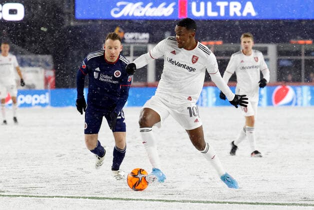 FOXBOROUGH, MA - MARCH 12: Real Salt Lake forward Sergio Cordova (10) shields the ball from New England Revolution midfielder Tommy McNamara (26) during a match between the New England Revolution and Real Salt Lake on March 12, 2022, at Gillette Stadium in Foxborough, Massachusetts. (Photo by Fred Kfoury III Icon Sportswire) SOCCER: MAR 12 MLS, Fussball Herren, USA - Real Salt Lake at New England Revolution Icon482220312013