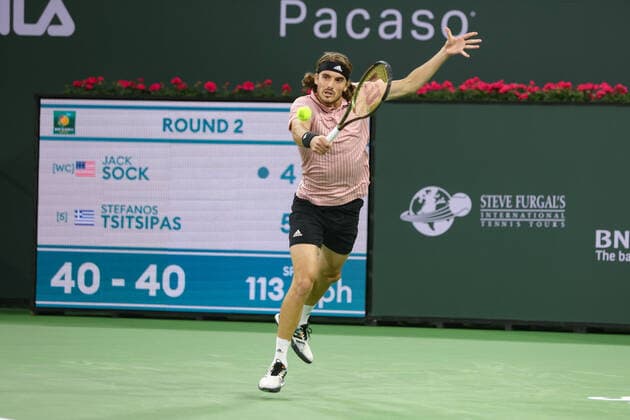 INDIAN WELLS, CA - MARCH 12: Stefanos Tsitsipas (GRE) hits a backhand during the BNP Paribas Open on March 12, 2022 at Indian Wells Tennis Garden in Indian Wells, CA. (Photo by George Walker Icon Sportswire) TENNIS: MAR 12 BNP Paribas Open Icon220312061