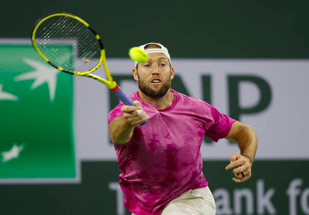 March 12, 2022 Jack Sock returns a shot against Stefanos Tsitsipas of Greece during the 2022 BNP Paribas Open at Indian Wells Tennis Garden in Indian Wells, California. Mandatory Photo Credit: CSM. Indian Wells United States of America - ZUMAc04_ 20220312_zaf_c04_358 Copyright: xCharlesxBausx