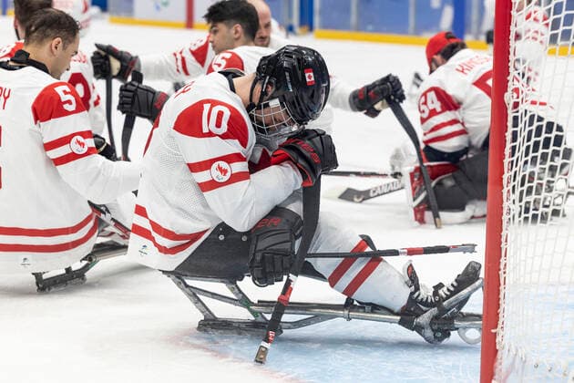 (220313) -- BEIJING, March 13, 2022 -- Players of Canada react after the Para Ice hockey, Eishockey Gold Medal Game between the United States and Canada of the Beijing 2022 Paralympic Winter games, Winterspiele,Spiele, Summer games at National Indoor Stadium in Beijing, capital of China, March 13, 2022. ) (SP)CHINA-BEIJING-WINTER PARALYMPICS-PARA ICE HOCKEY-GOLD MEDAL GAME-USA VS CAN (CN) CaixYang 