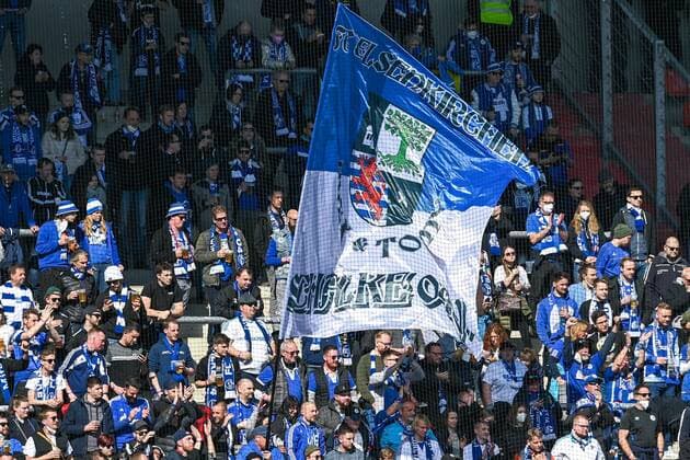 Schalke fans waving a big Schalke flag, fans, audience, spectators, atmosphere, stadium, 13 03 2022, Ingolstadt Germany , football, 2 Bundesliga, FC Ingolstadt 04 FC Schalke 04, DFB DFL REGULATES PROHIBIT ANY USE OF PHOTOGRAPHS AS IMAGE SEQUENCES AND OR QUASI VIDEO xslx