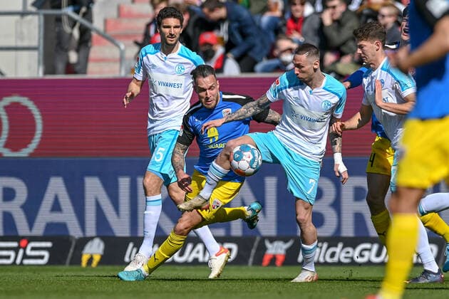 v li Patrick Schmidt FC Ingolstadt, 32 Darko Churlinov Schalke, 7 in duel, duel, tackle, dynamics, action, action, 13 03 2022, Ingolstadt Germany , Football, 2 Bundesliga, FC Ingolstadt 04 FC Schalke 04, DFB DFL REGULATIONS PROHIBIT ANY USE OF PHOTOGRAPHS AS IMAGE SEQUENCES AND OR QUASI VIDEO xslx