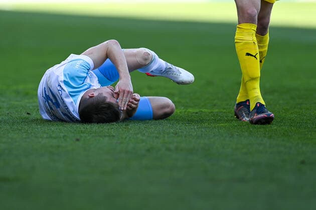 Reinhold Ranftl Schalke, 27 lying on the ground, racked with pain after a foul, 13 03 2022, Ingolstadt Germany , Football, 2 Bundesliga, FC Ingolstadt 04 FC Schalke 04, DFB DFL REGULATES PROHIBIT ANY USE OF PHOTOGRAPHS AS IMAGE SEQUENCES AND OR QUASI VIDEO xslx