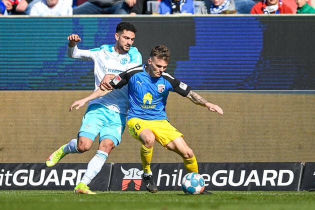 v li Kerim Calhanoglu Schalke, 42 Florian Pick FC Ingolstadt, 26 in duel, duel, tackle, dynamics, action, action, 13 03 2022, Ingolstadt Germany , Football, 2 Bundesliga, FC Ingolstadt 04 FC Schalke 04, DFB DFL REGULATIONS PROHIBIT ANY USE OF PHOTOGRAPHS AS IMAGE SEQUENCES AND OR QUASI VIDEO xslx