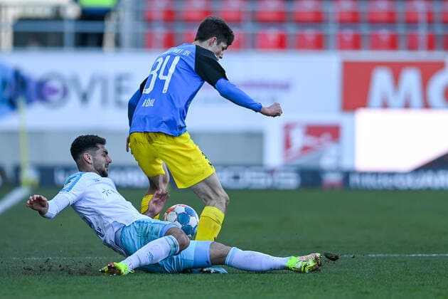 v li Kerim Calhanoglu Schalke, 42 Merlin Röhl FC Ingolstadt, 34 in duel, duel, tackle, dynamic, action, action, 13 03 2022, Ingolstadt Germany , Football, 2 Bundesliga, FC Ingolstadt 04 FC Schalke 04, DFB DFL REGULATIONS PROHIBIT ANY USE OF PHOTOGRAPHS AS IMAGE SEQUENCES AND OR QUASI VIDEO xslx