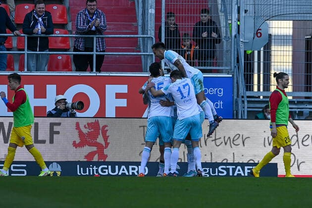 Schalke player celebrating goal, celebrating goal, celebrating goal, celebrating goal, celebrating goal for 0 2 by Malick Thiaw Schalke, 33 covered , optimistic, action, action, 13 03 2022, Ingolstadt Germany , Football, 2 Bundesliga, FC Ingolstadt 04 FC Schalke 04, DFB DFL REGULATES PROHIBIT ANY USE OF PHOTOGRAPHS AS IMAGE SEQUENCES AND OR QUASI VIDEO xslx