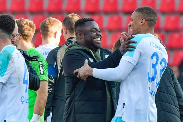 Schalke veteran Gerald Asamoha is visibly pleased after the game about the victory of his team in the game with goal scorer Malick Thiaw Schalke 04, No 33 FC Ingolstadt 04 against Schalke 04 on 13 03 2022, DFL regulations prohibit any use of photographs as image sequences and or quasi video GER, Football, 2 Bundesliga, Matchday 26, FC Ingolstadt 04 against Schalke 04, 13 03 2022, Audi Sportpark Ingolstadt Copyright: xEibner-Pressefotox xOliverxSTRISCHx