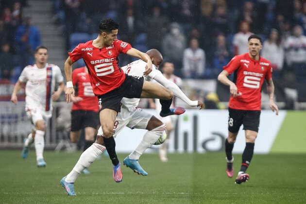 Nayef Aguerd (Rennes) vs Moussa Dembele (Olympique Lyonnais) FOOTBALL : Olympique Lyonnais vs Stade Rennais - Ligue 1 Uberteat - 13 03 2022 AurelienMorissard Panoramic 