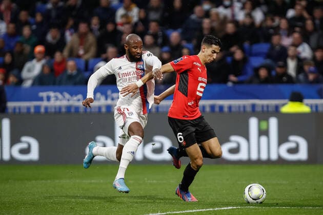 Moussa Dembele (Olympique Lyonnais) vs Nayef Aguerd (Rennes) FOOTBALL : Olympique Lyonnais vs Stade Rennais - Ligue 1 Uberteat - 13 03 2022 AurelienMorissard Panoramic 