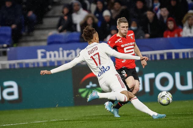 Malo Gusto (Olympique Lyonnais) vs Adrien Truffert (Rennes) FOOTBALL : Olympique Lyonnais vs Stade Rennais - Ligue 1 Uberteat - 13 03 2022 AurelienMorissard Panoramic 