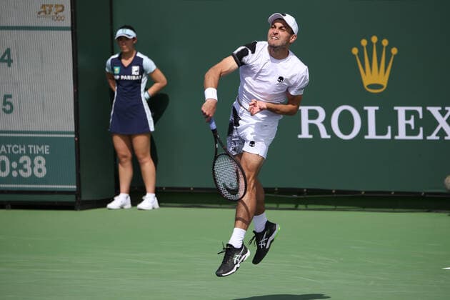 INDIAN WELLS, CA - MARCH 13: Aslan Karatsev serves during the BNP Paribas Open on March 12, 2022 at Indian Wells Tennis Garden in Indian Wells, CA. (Photo by George Walker Icon Sportswire) TENNIS: MAR 13 BNP Paribas Open Icon220313019