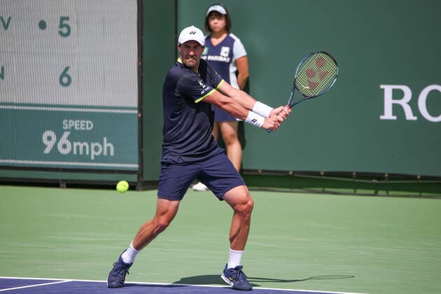 INDIAN WELLS, CA - MARCH 13: Steve Johnson (USA) hits a backhand during the BNP Paribas Open on March 12, 2022 at Indian Wells Tennis Garden in Indian Wells, CA. (Photo by George Walker Icon Sportswire) TENNIS: MAR 13 BNP Paribas Open Icon220313022