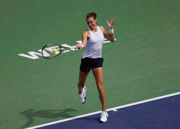 March 13, 2022 Petra Martic of Croatia returns a shot against Emma Raducanu of Great Britain during the 2022 BNP Paribas Open at Indian Wells Tennis Garden in Indian Wells, California. Mandatory Photo Credit: CSM. Indian Wells United States of America - ZUMAc04_ 20220313_zaf_c04_062 Copyright: xCharlesxBausx