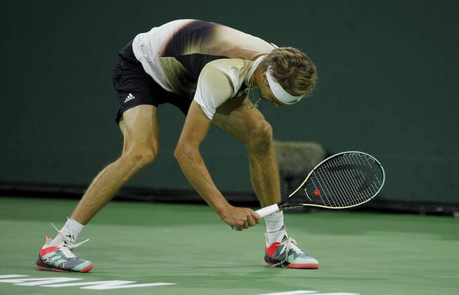 Mandatory Credit: Photo by Ella Ling Shutterstock (12845054dk) Alexander Zverev of Germany goes to smash his racquet BNP Paribas Open, Tennis, Day 5, Indian Wells Tennis Garden, California, USA - 13 Mar 2022 BNP Paribas Open, Tennis, Day 5, Indian Wells Tennis Garden, California, USA - 13 Mar 2022  Copyright: xEllaxLing Shutterstockx 12845054dk