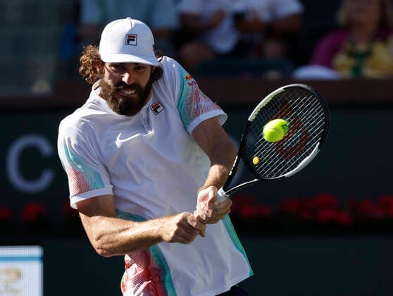 March 14, 2022 Reilly Opelka returns a shot against Denis Shapovalov of Canada during the 2022 BNP Paribas Open at Indian Wells Tennis Garden in Indian Wells, California. Mandatory Photo Credit: CSM. Indian Wells United States of America - ZUMAc04_ 20220314_zaf_c04_121 Copyright: xCharlesxBausx