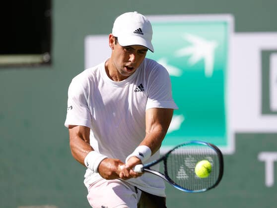 March 15, 2022 Jaume Munar of Spain returns a shot against Taylor Fritz during the 2022 BNP Paribas Open at Indian Wells Tennis Garden in Indian Wells, California. Mandatory Photo Credit: CSM. Indian Wells United States of America - ZUMAc04_ 20220315_zaf_c04_085 Copyright: xCharlesxBausx