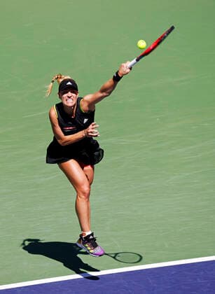 March 15, 2022 Angelique Kerber of Germany serves against Iga Swiatek of Poland during the 2022 BNP Paribas Open at Indian Wells Tennis Garden in Indian Wells, California. Mandatory Photo Credit: CSM. Indian Wells United States of America - ZUMAc04_ 20220315_zaf_c04_107 Copyright: xCharlesxBausx