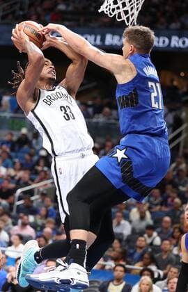 March 15, 2022, Orlando, Florida, USA: The Orlando Magic s Moritz Wagner (21) stops a drive by the Brooklyn Nets Nicolas Claxton (33) at the Amway Center on Tuesday, March 15, 2022, in Orlando, Florida. The Nets won, 150-108. Orlando USA - ZUMAm67_ 0152759033st Copyright: xStephenxM.xDowellx