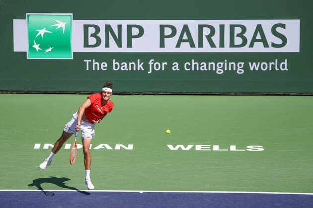 INDIAN WELLS, CA - MARCH 16: Taylor Fritz (USA) serves during the BNP Paribas Open on March 16, 2022 at Indian Wells Tennis Garden in Indian Wells, CA. (Photo by George Walker Icon Sportswire) TENNIS: MAR 16 BNP Paribas Open Icon220316009