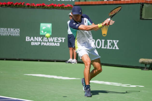 INDIAN WELLS, CA - MARCH 16: Alex De Minaur (AUS) hits a backhand during the BNP Paribas Open on March 16, 2022 at Indian Wells Tennis Garden in Indian Wells, CA. (Photo by George Walker Icon Sportswire) TENNIS: MAR 16 BNP Paribas Open Icon220316011