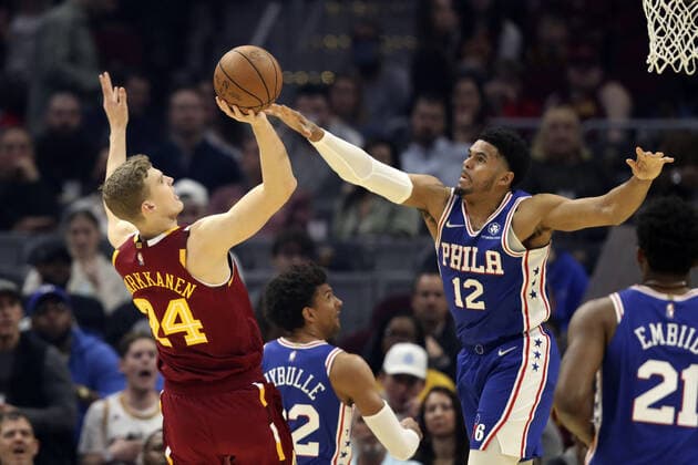 Cleveland Cavaliers Lauri Markkanen (24) puts up a shot over Philadelphia 76ers Tobias Harris (12) at Rocket Mortgage Field House in Cleveland, Ohio on Wednesday, March 16, 2022.  CLE20220316107 AARONxJOSEFCZYK