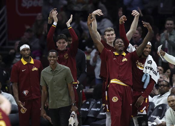 Cleveland Cavaliers players celebrate a three point shot against the Philadelphia 76ers at Rocket Mortgage Field House in Cleveland, Ohio on Wednesday, March 16, 2022.  CLE20220316110 AARONxJOSEFCZYK