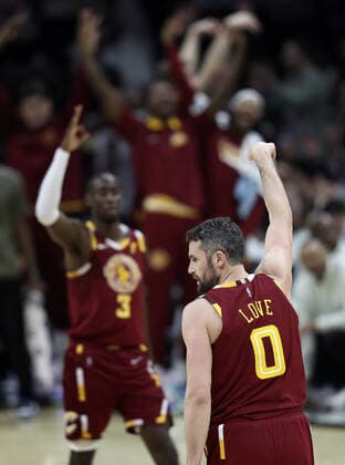 Cleveland Cavaliers Kevin Love (0) celebrates a three point shot against the Philadelphia 76ers at Rocket Mortgage Field House in Cleveland, Ohio on Wednesday, March 16, 2022.  CLE20220316111 AARONxJOSEFCZYK