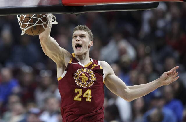 Cleveland Cavaliers Lauri Markkanen (24) dunks against the Philadelphia 76ers at Rocket Mortgage Field House in Cleveland, Ohio on Wednesday, March 16, 2022.  CLE20220316103 AARONxJOSEFCZYK