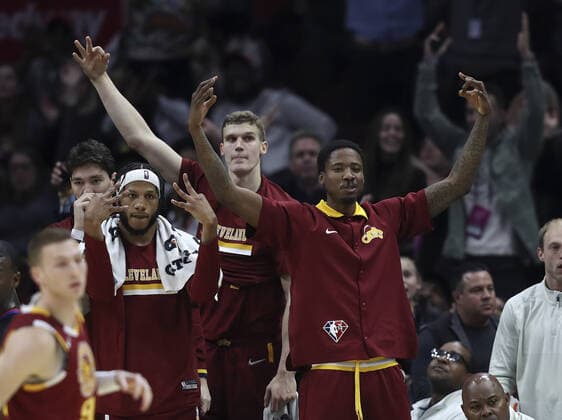 Cleveland Cavaliers (L-R) Lamar Stevens, Lauri Markkanen and Ed Davis celebrate a three point shot against the Philadelphia 76ers at Rocket Mortgage Field House in Cleveland, Ohio on Wednesday, March 16, 2022.  CLE20220316119 AARONxJOSEFCZYK