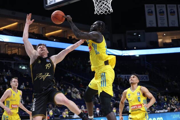 DEU, easyCredit BBL, ALBA vs Braunschweig, 16 03 2022, Mercedes Benz Arena, Berlin, DEU, easyCredit BBL, ALBA vs Braunschweig, in picture Christ Koumadje ALBA Berlin 21 , Ondrej Sehnal Braunschweig 19 nordphotoxGmbHx xEngler nph00076