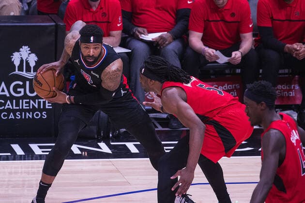 March 16, 2022, Los Angeles, California, USA: Marcus Morris 8 of the Los Angeles Clippers looks to pass the ball as Precious Achiuwa 5 of the Toronto Raptors defends during their NBA, Basketball Herren, USA game on Wednesday March 16, 2022 at the Crypto.com Arena in Los Angeles, California. Clippers lose to Raptors, 100-103. ARIANA RUIZ PI Los Angeles USA - ZUMAp124 20220316_zaa_p124_030 Copyright: xArianaxRuizx