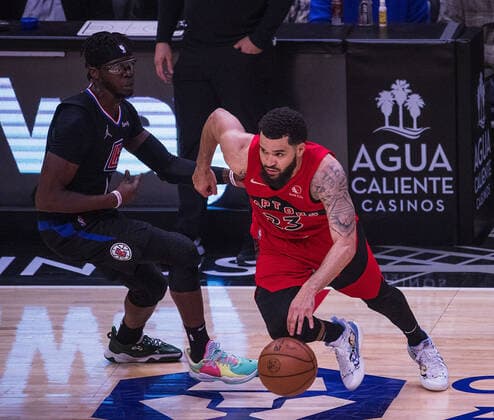 March 16, 2022, Los Angeles, California, USA: Fred VanVleet 23 of the Toronto Raptors in runs toward the basket as Reggie Jackson 1 of the Los Angeles Clippers defends during their NBA, Basketball Herren, USA game on Wednesday March 16, 2022 at the Crypto.com Arena in Los Angeles, California. Clippers lose to Raptors, 100-103. ARIANA RUIZ PI Los Angeles USA - ZUMAp124 20220316_zaa_p124_023 Copyright: xArianaxRuizx