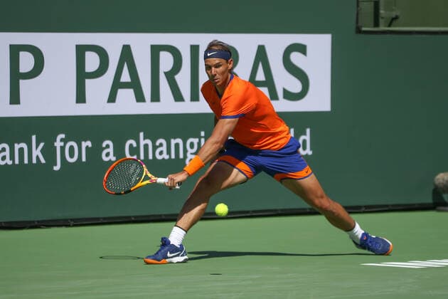 INDIAN WELLS, CA - MARCH 16: Rafael Nadal (ESP) hits a backhand during the BNP Paribas Open on March 16, 2022 at Indian Wells Tennis Garden in Indian Wells, CA. (Photo by George Walker Icon Sportswire) TENNIS: MAR 16 BNP Paribas Open Icon220316054