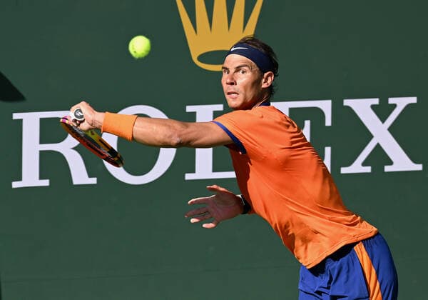 INDIAN WELLS, CA - MARCH 16: Rafael Nadal of Spain returns the ball during a tennis match played on March 16, 2022 at the BNP Paribas Open at the Indian Wells Tennis Garden in Indian Wells, CA. (Photo by John Cordes Icon Sportswire) TENNIS: MAR 16 BNP Paribas Open Icon506220316045