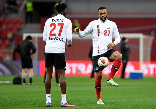 17 03 2022, Leverkusen, Germany, BayArena, Bayer 04 Leverkusen vs Atalanta Bergamo UEFA Europa League Round of 16, Edmond Tapsoba Bayer 04 Leverkusen and Jonathan Tah Bayer 04 Leverkusen in warm up jerseys by Florian Wirtz Bayer 04 Leverkusen photo Ralf Treese Leverkusen BayArena Nordrhein Westfalen Germany.  521_LEVATA20220317_003 Treese-521