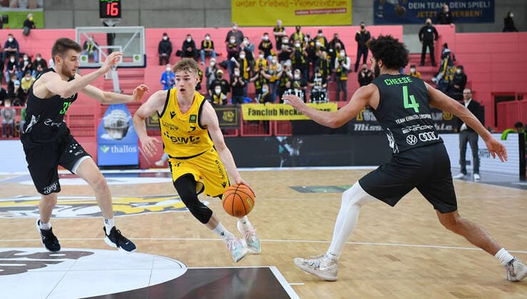 Basketball 2 Bundesliga 2020 2021 22 Game day at Paul Horn Arena Tigers Tuebingen Team Ehinge Urspring 17 03 2022 Timo Lanmueller center, Tigers vs Daniel Zdravevski li, Team Ehinge Urspring and Tyler Chesse re, Team Ehinge Urspring